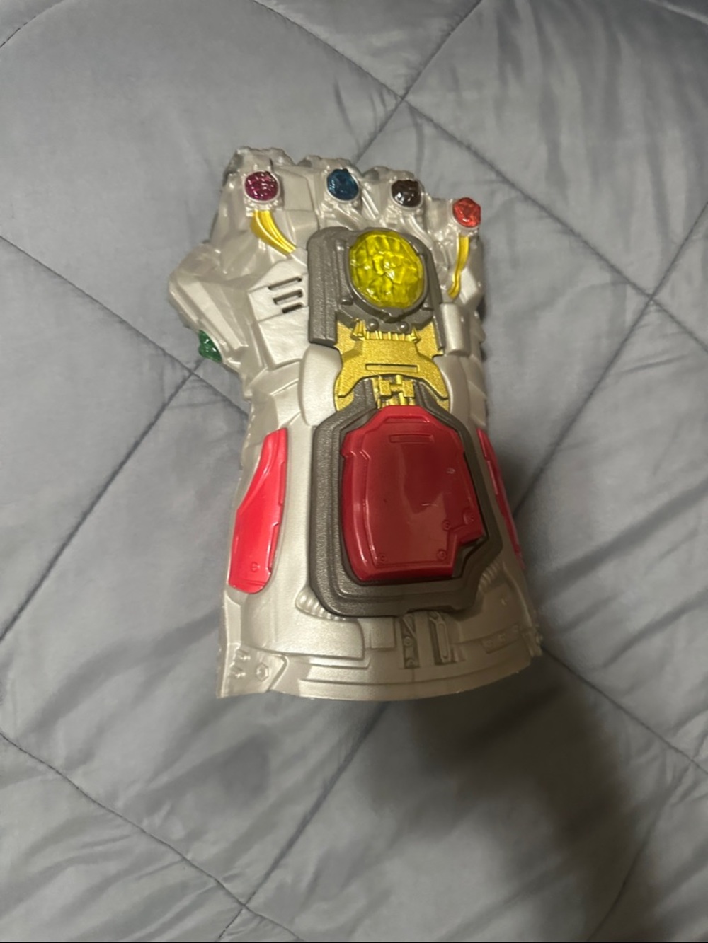 Marvel Silver Toy Gauntlet with Red and Yellow Accents